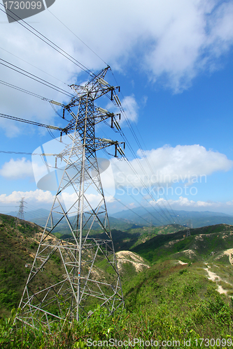 Image of Power transmission tower with cables 