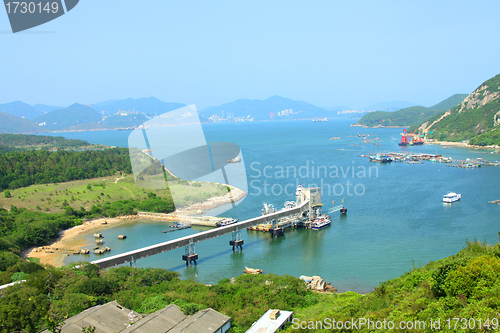 Image of Coastline with mountain ridges in Hong Kong at day time