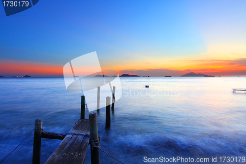 Image of Sunset along a wooden pier in Hong Kong