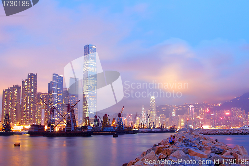 Image of Hong Kong harbour with moving ships at dusk