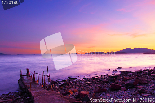 Image of Sunset along the coast under long exposure