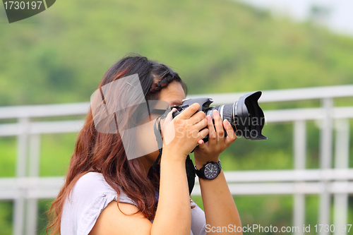 Image of Female photographer