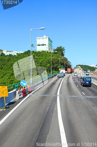 Image of Highway in Hong Kong at day with moving cars