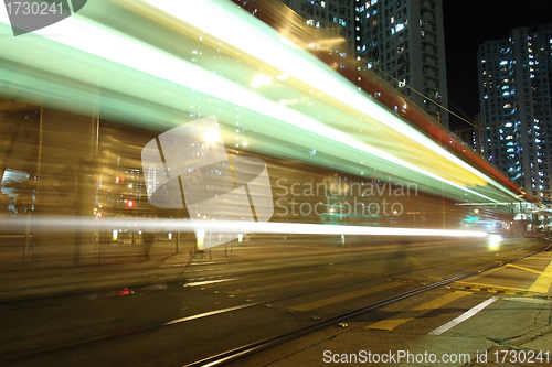 Image of Traffic in Hong Kong at night, light rail.