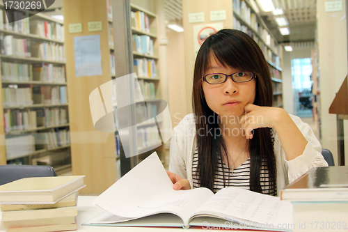 Image of Asian girl student in library