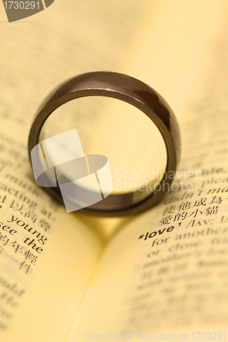 Image of Love in all around: a ring with a word "LOVE".