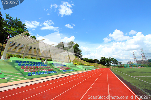 Image of Stadium chairs and running tracks