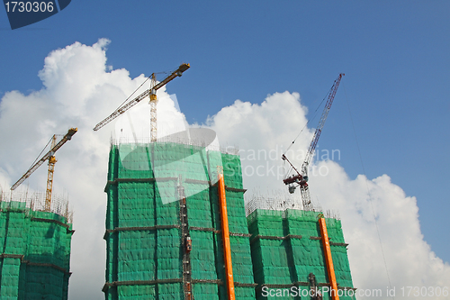 Image of Construction site with crane and building 