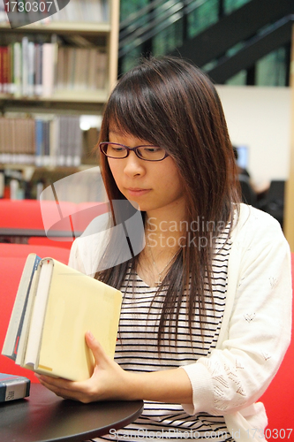 Image of Asian girl student in library