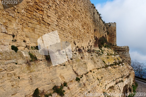 Image of Wall of  medieval castle on cloudy day