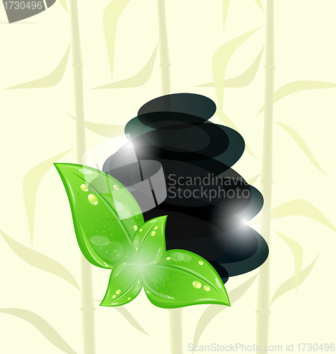 Image of Meditative bamboo background with cairn stones and eco green lea