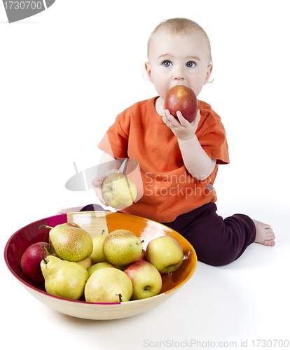 Image of baby with apples