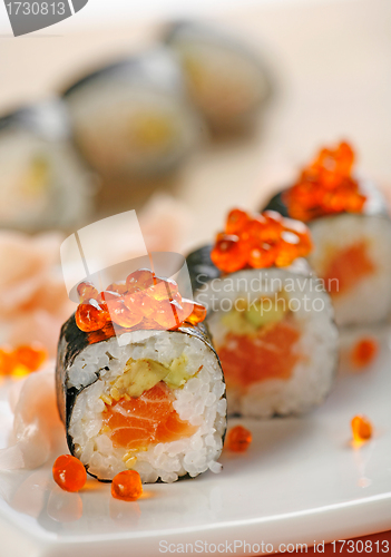 Image of sushi with salmon and red caviar