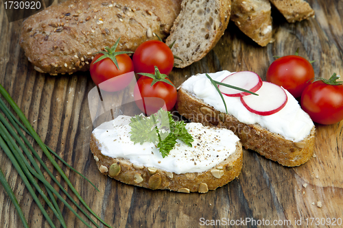 Image of fresh bread with herb curd dinner