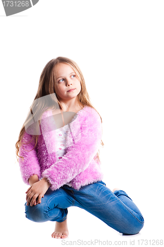 Image of beautiful  little girl in pink posing isolated on white 