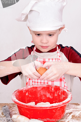 Image of child with egg