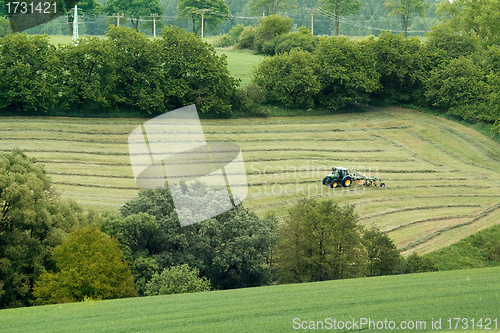 Image of Beautiful lansdscape with Haymaking