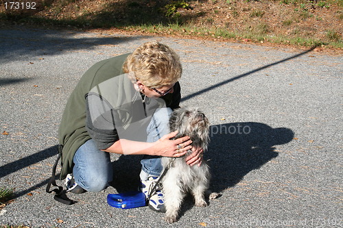 Image of Dog with the owner