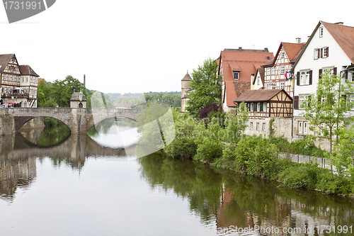 Image of historic city in germany with river and stone bridge