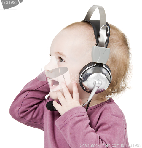 Image of young child with headset