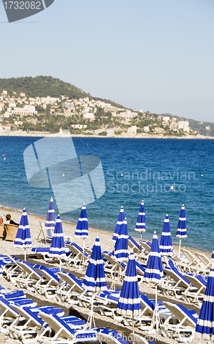 Image of beach lounge chairs Nice France Cote d' Azur