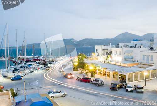 Image of Adamas Milos Cyclades Greek island town at dusk waterfront harbo