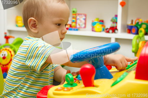 Image of Baby Playing With The Toys