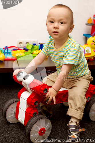 Image of Baby Playing With The Toys