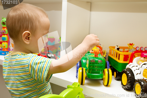 Image of Baby Playing With The Toys