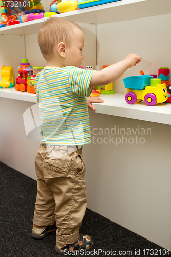 Image of Baby Playing With The Toys