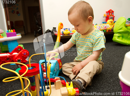 Image of Baby Playing With The Toys