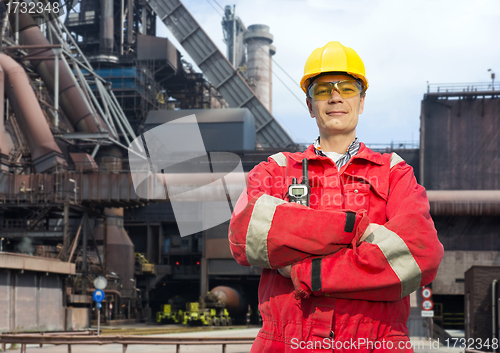 Image of Factory worker in overalls