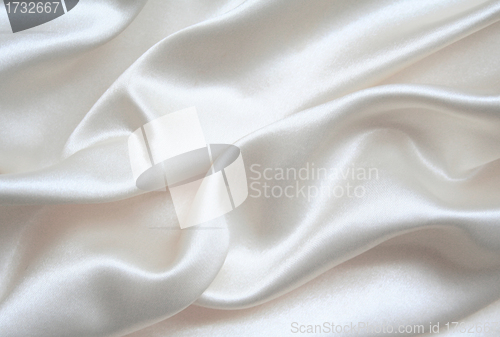 Image of Smooth elegant white silk as background 