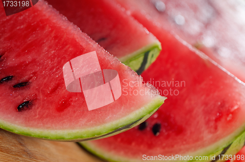 Image of fresh watermelon on a  wood table