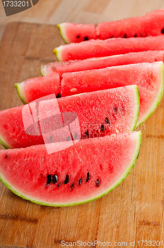 Image of fresh watermelon on a  wood table