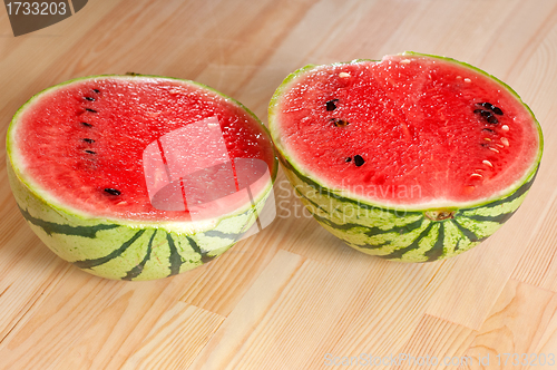 Image of fresh watermelon on a  wood table