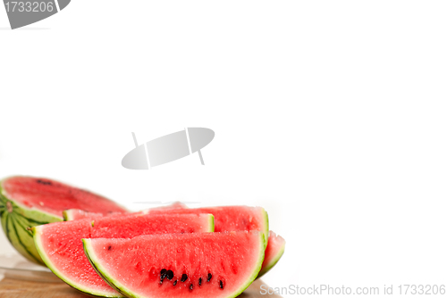 Image of fresh watermelon on a  wood table