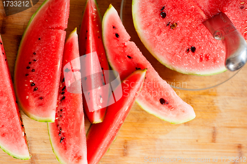 Image of fresh watermelon on a  wood table