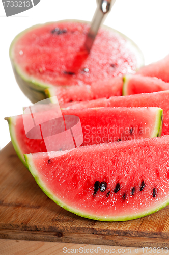 Image of fresh watermelon on a  wood table