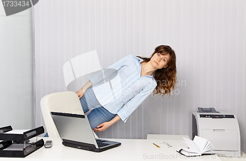 Image of Office worker goes crazy with work