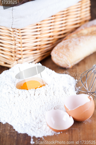 Image of still life of bread, flour, eggs 