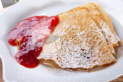 Image of pancakes with strawberry jam 