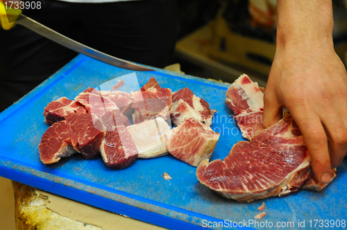 Image of cutting meat