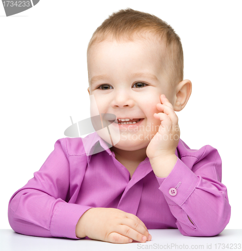 Image of Portrait of a cute and happy little boy