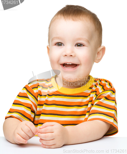 Image of Portrait of a cute cheerful little boy
