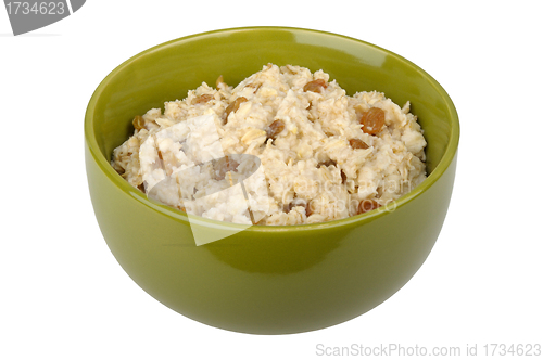 Image of Bowl of oatmeal cereal with raisins