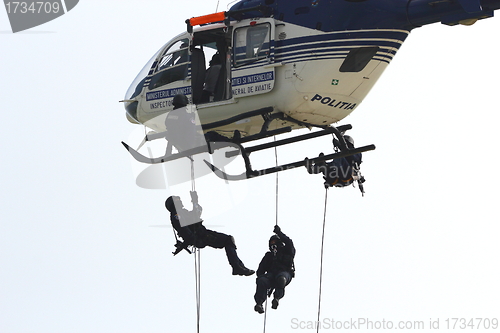 Image of police helicopter in rescue mission