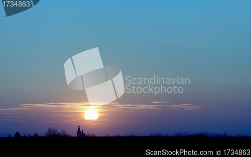 Image of Sunset over the old Christian Church