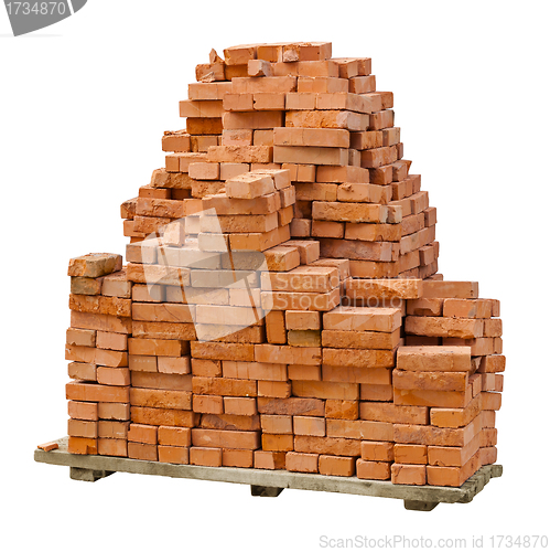 Image of Stack of red clay bricks on white background