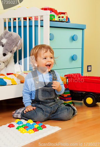 Image of Laughing baby assemble with mosaic